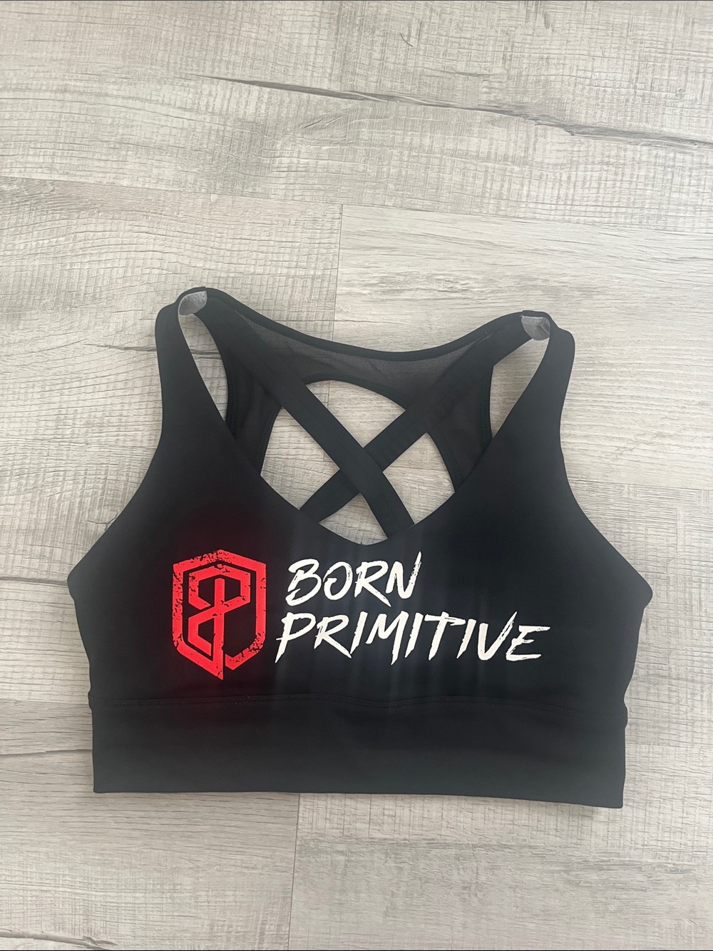 Born Primitive Black Sports Bra with Red and White Logo